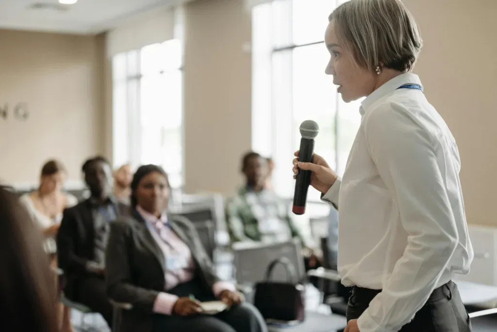 Brand representative speaking at an event